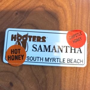 Hooters name tag with stickers